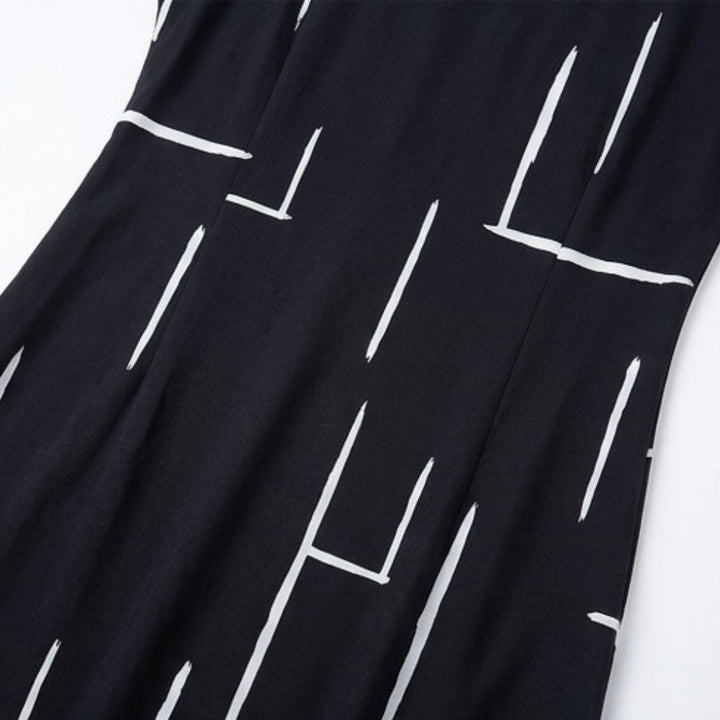Pocketed Dolman Dress with Abstract Print