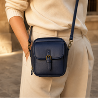 Structured PU crossbody bag with built-in wallet and glasses compartment